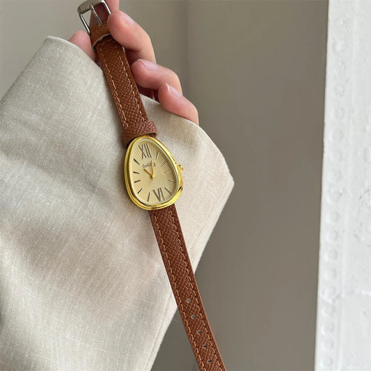 Elegantní dámské hodinky s hadím ciferníkem, quartzovým strojkem a červeným koženým řemínkem – stylové dámské hodinky pro každou příležitost